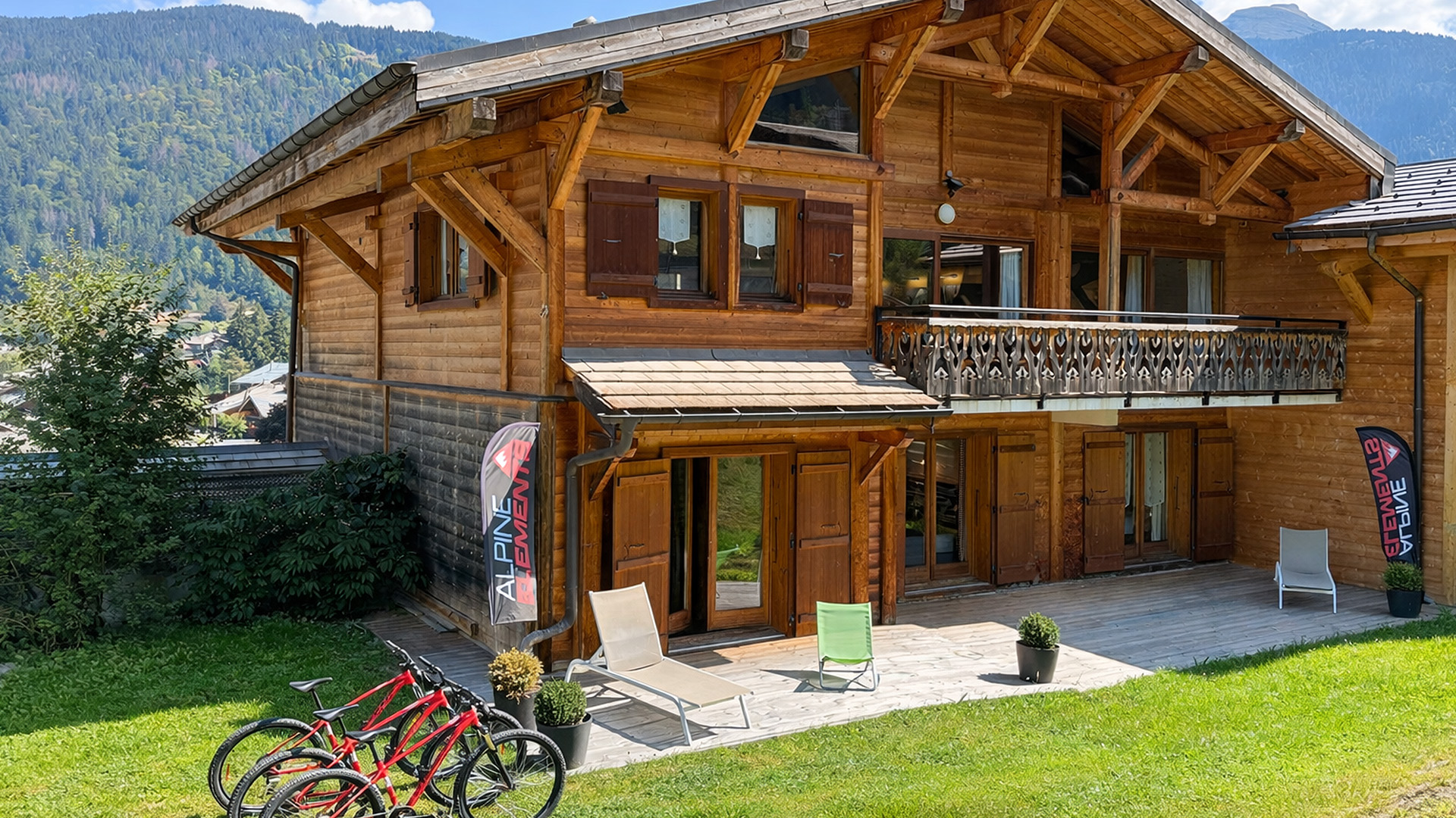 A summer chalet with bikes in front of it